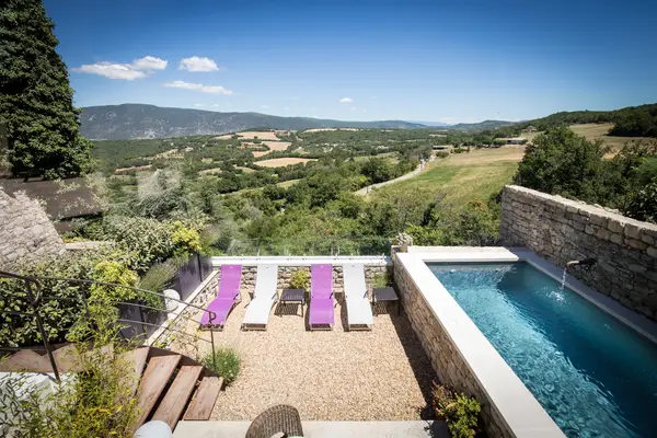 Terrace and swimming pool at La Bastide de Caseneuve